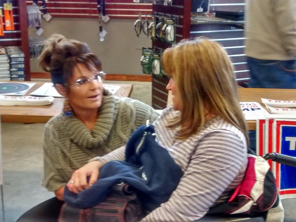Sarah Palin speaks to a Trump supporter at Zingers & Flingers gun, archery, shooting range in Wausau, WI 4/3/16 - PHOTO by Larry Lee, © 2016 Midwest Communications