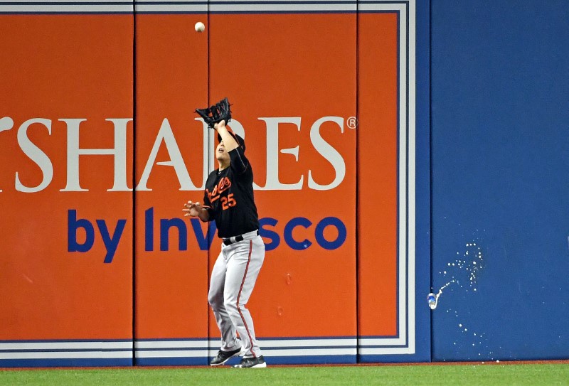 Toronto fan throws beer can at Orioles outfielder