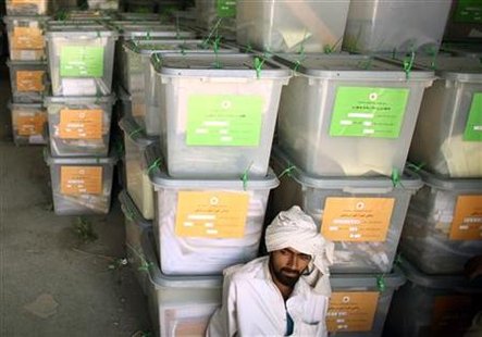 An Afghan man rests in front of ballot boxes at the Independent Election Commission in Kabul on August 25, 2009. REUTERS/Goran Tomasevic
An Afghan man rests in front of ballot boxes at the Independent Election Commission in Kabul on August 25, 2009. REUTERS/Goran Tomasevic