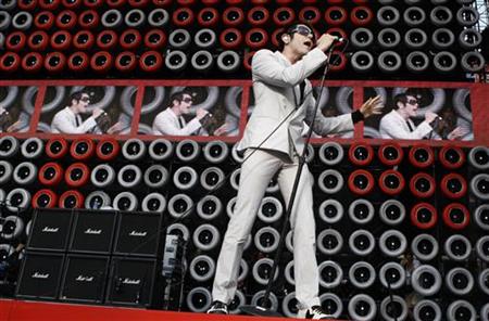 Davey Havok, lead singer of the band AFI, performs with his band during the New York Live Earth concert at Giants Stadium in East Rutherford, New Jersey July 7, 2007. REUTERS/Lucas Jackson
Davey Havok, lead singer of the band AFI, performs with his band during the New York Live Earth concert at Giants Stadium in East Rutherford, New Jersey July 7, 2007. REUTERS/Lucas Jackson