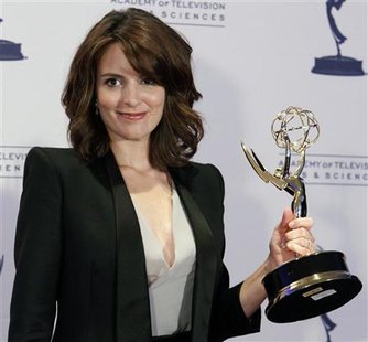 Actress Tina Fey poses with her Emmy award for Outstanding Guest Actress in a Comedy Series for her portrayal of Governor Sarah Palin on "Saturday Night Live" at the Primetime Creative Arts Emmy Awards in Los Angeles, September 12, 2009. REUTERS/Danny Moloshok
Actress Tina Fey poses with her Emmy award for Outstanding Guest Actress in a Comedy Series for her portrayal of Governor Sarah Palin on "Saturday Night Live" at the Primetime Creative Arts Emmy Awards in Los Angeles, September 12, 2009. REUTERS/Danny Moloshok
