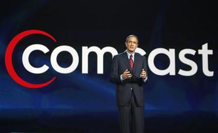 Comcast CEO Brian Roberts speaks at his keynote address at the Consumer Electronics Show in Las Vegas, Nevada January 8, 2008. REUTERS/Rick Wilking
Comcast CEO Brian Roberts speaks at his keynote address at the Consumer Electronics Show in Las Vegas, Nevada January 8, 2008. REUTERS/Rick Wilking