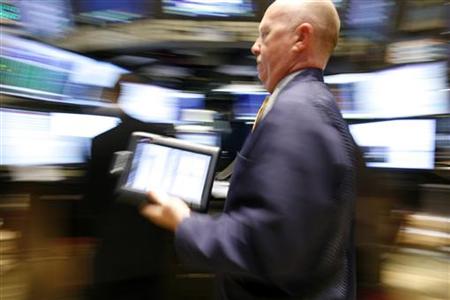 A trader works on the floor of the New York Stock Exchange, July 15, 2009. REUTERS/Brendan McDermid
A trader works on the floor of the New York Stock Exchange, July 15, 2009. REUTERS/Brendan McDermid
