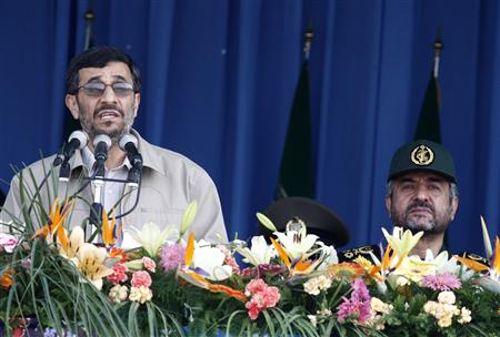 Iranian President Mahmoud Ahmadinejad speaks as Revolutionary Guards commander-in-chief Mohammad Ali Jafari (R) attends a military parade to mark the anniversary of the start of the 1980-1988 Iran-Iraq war in southern Tehran September 22, 2009. REUTERS/Raheb Homavandi
Iranian President Mahmoud Ahmadinejad speaks as Revolutionary Guards commander-in-chief Mohammad Ali Jafari (R) attends a military parade to mark the anniversary of the start of the 1980-1988 Iran-Iraq war in southern Tehran September 22, 2009. REUTERS/Raheb Homavandi