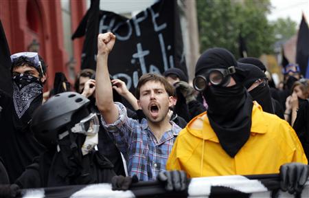 




Demonstrators march during a protest before the start of the G20 Pittsburgh Summit in Pittsburgh, Pennsylvania September 24, 2009. REUTERS/Carlos Barria

