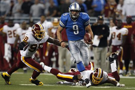 Detroit Lions quarterback Mathew Stafford runs with the ball in front of the Washington Redskins defense during the first half of their NFL football game in Detroit, Michigan September 27, 2009. REUTERS/Rebecca Cook
Detroit Lions quarterback Mathew Stafford runs with the ball in front of the Washington Redskins defense during the first half of their NFL football game in Detroit, Michigan September 27, 2009. REUTERS/Rebecca Cook