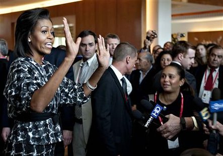 U.S. First Lady Michelle Obama gestures as she arrives at Hotel Marriott in Copenhagen, September 30, 2009. The first lady will support the Chicago delegation in the bid for the Summer Olympic Games 2016. The International Olympic Committee (IOC) will vote on the 2016 Summer Olympic Games on October 2, 2009 in Copenhagen. REUTERS/Scanpix/Nils Meilvang
U.S. First Lady Michelle Obama gestures as she arrives at Hotel Marriott in Copenhagen, September 30, 2009. The first lady will support the Chicago delegation in the bid for the Summer Olympic Games 2016. The International Olympic Committee (IOC) will vote on the 2016 Summer Olympic Games on October 2, 2009 in Copenhagen. REUTERS/Scanpix/Nils Meilvang