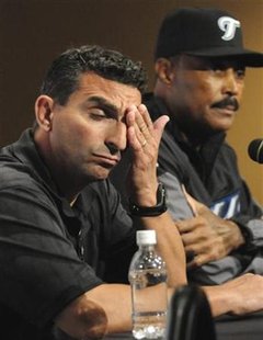 Toronto Blue Jays general manager J.P. Ricciardi (L) and new manager Cito Gaston address the media before a game against the Pittsburgh Pirates in Pittsburgh, Pennsylvania, in this June 20, 2008 file photo. REUTERS/David DeNoma/Files
Toronto Blue Jays general manager J.P. Ricciardi (L) and new manager Cito Gaston address the media before a game against the Pittsburgh Pirates in Pittsburgh, Pennsylvania, in this June 20, 2008 file photo. REUTERS/David DeNoma/Files