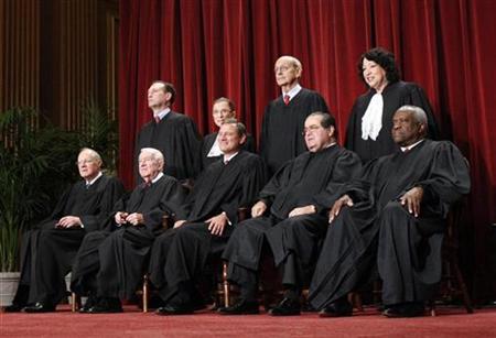 U.S. Supreme Court Justices gather for an official picture at the Supreme Court in Washington September 29, 2009. REUTERS/Jim Young
U.S. Supreme Court Justices gather for an official picture at the Supreme Court in Washington September 29, 2009. REUTERS/Jim Young