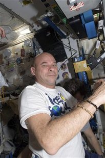 Canadian spaceflight participant Guy Laliberte is pictured in the Unity node of the International Space Station in this photo taken October 5, 2009 and released by NASA October 8, 2009. REUTERS/NASA/Handout
Canadian spaceflight participant Guy Laliberte is pictured in the Unity node of the International Space Station in this photo taken October 5, 2009 and released by NASA October 8, 2009. REUTERS/NASA/Handout