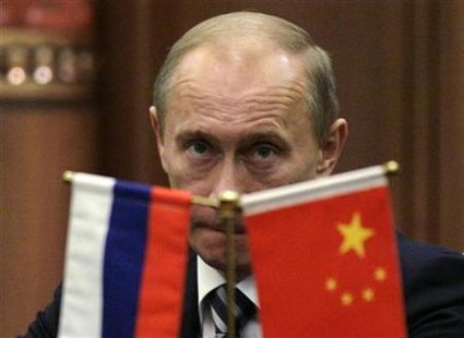 Russia's Prime Minister Vladimir Putin pauses during a news conference with China's Premier Wen Jiabao after a signing ceremony at the Great Hall of the People in Beijing October 13, 2009. REUTERS/Jason Lee
Russia's Prime Minister Vladimir Putin pauses during a news conference with China's Premier Wen Jiabao after a signing ceremony at the Great Hall of the People in Beijing October 13, 2009. REUTERS/Jason Lee