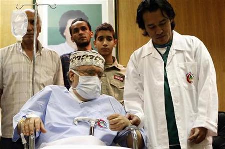 Abdel Basset al-Megrahi sits in a wheelchair in his room at a hospital in Tripoli September 9, 2009. REUTERS/Ismail Zetouny
Abdel Basset al-Megrahi sits in a wheelchair in his room at a hospital in Tripoli September 9, 2009. REUTERS/Ismail Zetouny