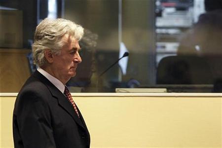 Former Bosnian Serb leader Radovan Karadzic attends a hearing at the United Nations tribunal in The Hague August 29, 2008. REUTERS/Valerie Kuypers/Pool
Former Bosnian Serb leader Radovan Karadzic attends a hearing at the United Nations tribunal in The Hague August 29, 2008. REUTERS/Valerie Kuypers/Pool