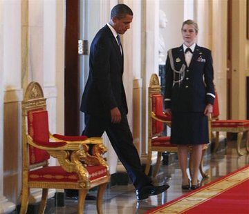 




President Barack Obama arrives for a ceremony for the signing of the National Defense Authorization Act for Fiscal Year 2010 in the East Room at the White House in Washington, October 28, 2009. REUTERS/Jim Young

