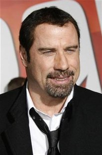 Actor John Travolta poses at the premiere of his animated film "Bolt" from Walt Disney Animation Studios in Hollywood November 17, 2008. Travolta provides one of the character voices in the film. REUTERS/Fred Prouser (UNITED STATES)
Actor John Travolta poses at the premiere of his animated film "Bolt" from Walt Disney Animation Studios in Hollywood November 17, 2008. Travolta provides one of the character voices in the film. REUTERS/Fred Prouser (UNITED STATES)