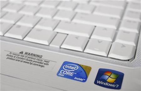 
The Intel logo is advertised on a computer at an electronic store in Phoenix, Arizona November 4, 2009. Intel Corp was sued by New York Attorney General Andrew Cuomo, who accused the world's largest chipmaker of threatening computer makers and paying billions of dollars in kickbacks to maintain its market dominance. REUTERS/Joshua Lott
