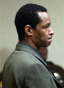 Sniper suspect John Allen Muhammad stands as the judge enters the court after a break in his trial in the Virginia Beach Circuit Court in Virginia Beach, Virginia, in this November 12, 2003 file photograph. John Allen Muhammad was executed on Tuesday for masterminding and carrying out with his teenage accomplice the 2002 sniper shootings that killed 10 people and terrified the Washington, D.C., region a year after the 9/ll and the deadly anthrax
Sniper suspect John Allen Muhammad stands as the judge enters the court after a break in his trial in the Virginia Beach Circuit Court in Virginia Beach, Virginia, in this November 12, 2003 file photograph. John Allen Muhammad was executed on Tuesday for masterminding and carrying out with his teenage accomplice the 2002 sniper shootings that killed 10 people and terrified the Washington, D.C., region a year after the 9/ll and the deadly anthrax
