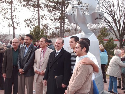 Mustafa Saleh and Deputy Consul Mahmoud Amer pose with the Egyptian delegation in front of the Peace Monument today Mustafa Saleh and Deputy Consul Mahmoud Amer pose with the Egyptian delegation in front of the Peace Monument today