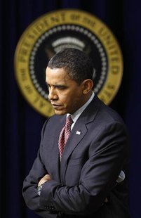 
U.S. President Barack Obama listens to a question during the Jobs and Economic Growth Forum at the White House in Washington December 3, 2009. REUTERS/Kevin Lamarque
