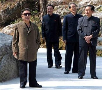 




North Korean leader Kim Jong-il (L) visits the newly-built Mount Myohyang pleasure ground in Mt Myohyang, about 160 km (99 miles) northeast of the North Korean capital Pyongyang, in this undated picture released on October 26, 2009 by North Korea's official news agency Korean Central News Agency. KCNA did not state expressly the REUTERS/KCNA

