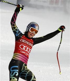 
Lindsey Vonn of the U.S. celebrates her first place win during the women's World Cup downhill alpine ski race in Lake Louise, Alberta, December 5, 2009. REUTERS/Andy Clark
