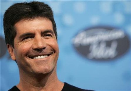 Judge Simon Cowell attends the party for the 12 finalists of the television show "American Idol" at the Pacific Design Center in Los Angeles March 9, 2006. REUTERS/Mario Anzuoni
Judge Simon Cowell attends the party for the 12 finalists of the television show "American Idol" at the Pacific Design Center in Los Angeles March 9, 2006. REUTERS/Mario Anzuoni