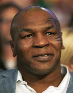 Former heavyweight champion Mike Tyson looks on prior to the start of the WBC Heavyweight Championship boxing bout between Vitali Klitschko of Ukraine and Cristobal Arreola of the U.S. in Los Angeles, California, September 26, 2009. REUTERS/Mike Blake
Former heavyweight champion Mike Tyson looks on prior to the start of the WBC Heavyweight Championship boxing bout between Vitali Klitschko of Ukraine and Cristobal Arreola of the U.S. in Los Angeles, California, September 26, 2009. REUTERS/Mike Blake