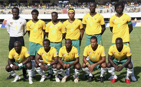 Togo's national team (Back L-R) Kodjovi Dodji Obilale, Senah Mango, Mohammed Abdel Kader Toure, Thomas Dossevi, Dare Nibombe, Emmanuel Adebayor, (Front L-R), Euloge Ahodikpe, Assimiou Toure, Serge Akakpo, Jacques Romao, Moustapha Salifou pose for a photograph before their World Cup 2010 qualifying soccer match against Morocco at the Kegue stadium in Lome, in this September 6, 2009 file photo. REUTERS/Noel Kokou Tadegnon/Files
Togo's national team (Back L-R) Kodjovi Dodji Obilale, Senah Mango, Mohammed Abdel Kader Toure, Thomas Dossevi, Dare Nibombe, Emmanuel Adebayor, (Front L-R), Euloge Ahodikpe, Assimiou Toure, Serge Akakpo, Jacques Romao, Moustapha Salifou pose for a photograph before their World Cup 2010 qualifying soccer match against Morocco at the Kegue stadium in Lome, in this September 6, 2009 file photo. REUTERS/Noel Kokou Tadegnon/Files