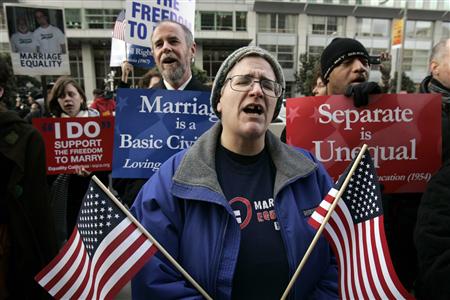 Marilee Kreml sings with a group of same-sex marriage supporters outside the federal courthouse in San Francisco, California January 11, 2010. California's ban on gay marriage went to trial in a federal case that plaintiffs hope to take all the way to the U.S. Supreme Court and overturn bans throughout the nation. REUTERS/Robert Galbraith
Marilee Kreml sings with a group of same-sex marriage supporters outside the federal courthouse in San Francisco, California January 11, 2010. California's ban on gay marriage went to trial in a federal case that plaintiffs hope to take all the way to the U.S. Supreme Court and overturn bans throughout the nation. REUTERS/Robert Galbraith