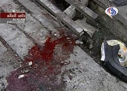 A video grab of a pool of blood at the site of a bomb blast in Tehran, January 12, 2009. A remote-controlled bomb killed a Tehran University nuclear scientist on Tuesday, media reported, in an attack which the state broadcaster blamed on "anti-revolutionary" elements linked to Iran's foreign foes. REUTERS/Al Alam via Reuters TV
A video grab of a pool of blood at the site of a bomb blast in Tehran, January 12, 2009. A remote-controlled bomb killed a Tehran University nuclear scientist on Tuesday, media reported, in an attack which the state broadcaster blamed on "anti-revolutionary" elements linked to Iran's foreign foes. REUTERS/Al Alam via Reuters TV
