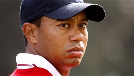 U.S. team member Tiger Woods watches play as he stands on the sixth hole during his foursome match at the Presidents Cup golf tournament at Harding Park golf course in San Francisco, California, in this October 8, 2009 file photo. REUTERS/Shaun Best/Files
U.S. team member Tiger Woods watches play as he stands on the sixth hole during his foursome match at the Presidents Cup golf tournament at Harding Park golf course in San Francisco, California, in this October 8, 2009 file photo. REUTERS/Shaun Best/Files