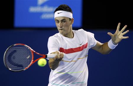 Australia's Bernard Tomic returns a shot against Marin Cilic of Croatia at the Australian Open tennis tournament in Melbourne January 20, 2010. REUTERS/Tim Wimborne
Australia's Bernard Tomic returns a shot against Marin Cilic of Croatia at the Australian Open tennis tournament in Melbourne January 20, 2010. REUTERS/Tim Wimborne