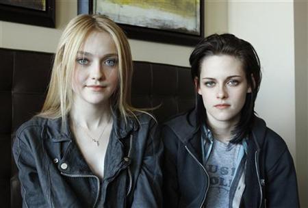 Actresses Kristen Stewart (R) and Dakota Fanning who star in the movie "The Runaways" pose for a portrait during the 2010 Sundance Film Festival in Park City, Utah January 24, 2010. REUTERS/Mario Anzuoni
Actresses Kristen Stewart (R) and Dakota Fanning who star in the movie "The Runaways" pose for a portrait during the 2010 Sundance Film Festival in Park City, Utah January 24, 2010. REUTERS/Mario Anzuoni