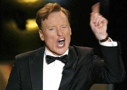 
Host Conan O'Brien gestures onstage during the 58th annual Primetime Emmy Awards at the Shrine Auditorium in Los Angeles in this August 27, 2006 file photo. REUTERS/Mike Blake/Files
