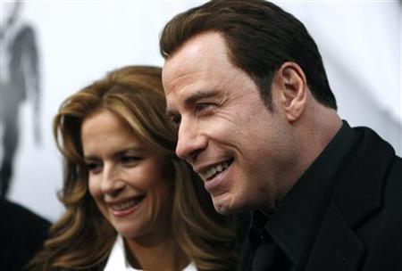 Actor John Travolta (R) and his wife Kelly Preston speak to television reporters as they arrive at the premiere of "From Paris With Love" in New York January 28, 2010. REUTERS/Jessica Rinaldi
Actor John Travolta (R) and his wife Kelly Preston speak to television reporters as they arrive at the premiere of "From Paris With Love" in New York January 28, 2010. REUTERS/Jessica Rinaldi