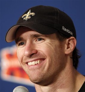 New Orleans Saints quarterback Drew Brees answers a question from the media at the Dolphins Practice complex in Davie, Florida February 1, 2010. The Saints will play the Indianapolis Colts in Super Bowl XLIV on February 7, 2010. REUTERS/Jeff Haynes
New Orleans Saints quarterback Drew Brees answers a question from the media at the Dolphins Practice complex in Davie, Florida February 1, 2010. The Saints will play the Indianapolis Colts in Super Bowl XLIV on February 7, 2010. REUTERS/Jeff Haynes