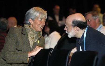 
France's Finance Minister Christine Lagarde speaks with Federal Reserve Chairman Ben Bernanke during the G7 finance ministers' meeting in Iqaluit, Nunavut, February 5, 2010. REUTERS/Chris Wattie
