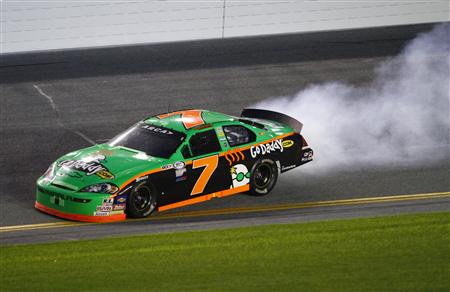 Danica Patrick gets sideways on the tri-oval in her number 7 car as she races in her first ever stock car race in the Lucas Oil Slick Mist 200 ARCA race at Daytona International Speedway in Daytona Beach, Florida, February 6, 2010. REUTERS/Brian Blanco
Danica Patrick gets sideways on the tri-oval in her number 7 car as she races in her first ever stock car race in the Lucas Oil Slick Mist 200 ARCA race at Daytona International Speedway in Daytona Beach, Florida, February 6, 2010. REUTERS/Brian Blanco