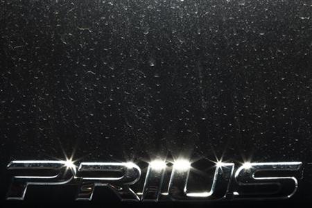 
A Toyota Prius vehicle is pictured parked at a dealership in Crissier near Lausanne February 7, 2010. REUTERS/Valentin Flauraud
