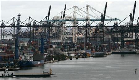 A cargo ship sits at the dock at a port of Miami in this October 4, 2007 file photo. REUTERS/Carlos Barria
A cargo ship sits at the dock at a port of Miami in this October 4, 2007 file photo. REUTERS/Carlos Barria