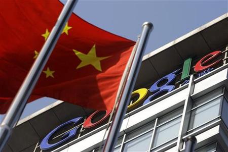 
A Chinese national flag sways in front of Google China's headquarters in Beijing in this January 14, 2010 file photo. REUTERS/Jason Lee/Files
