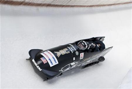 US team members Steven Holcomb (L-R), Justin Olsen, Steve Mesler and Curtis Tomasevicz speed down the track during the Bobsleigh and Skeleton World Cup competition in Igls/Innsbruck January 24, 2010. REUTERS/Miro Kuzmanovic
US team members Steven Holcomb (L-R), Justin Olsen, Steve Mesler and Curtis Tomasevicz speed down the track during the Bobsleigh and Skeleton World Cup competition in Igls/Innsbruck January 24, 2010. REUTERS/Miro Kuzmanovic