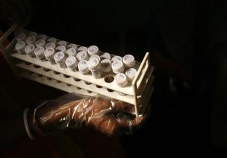 
An Indian health official stores blood samples from sex workers and their clients in a HIV test laboratory in Sonagachi, the red-light district of the eastern Indian city of Kolkata April 24, 2008. REUTERS/Jayanta Shaw

