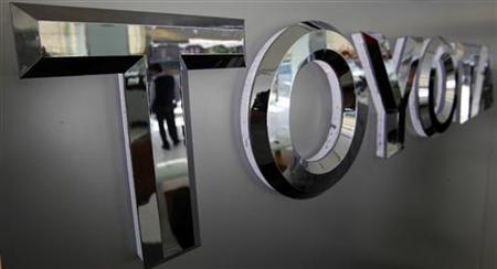 A man is reflected on a Toyota logo in a vehicle showroom in Taipei March 3, 2010. REUTERS/Nicky Loh
A man is reflected on a Toyota logo in a vehicle showroom in Taipei March 3, 2010. REUTERS/Nicky Loh