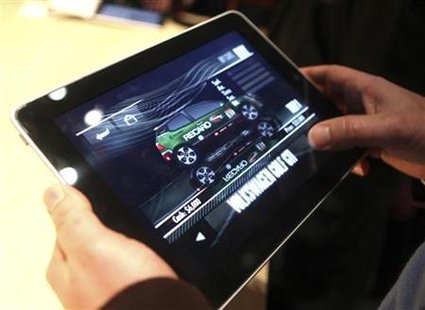 
A video game is displayed on Apple's "iPad" , a new tablet computing device, after its launch event in San Francisco, California, January 27, 2010. REUTERS/Kimberly White
