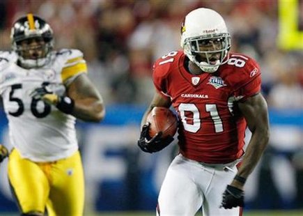 Arizona Cardinals wide receiver Anquan Boldin (81) is chased by Pittsburgh Steelers linebacker Woodley LaMarr (L) as he runs with the ball after a catch in the second quarter of the NFL's Super Bowl XLIII football game in Tampa, Florida, February 1, 2009. REUTERS/Scott Audette
Arizona Cardinals wide receiver Anquan Boldin (81) is chased by Pittsburgh Steelers linebacker Woodley LaMarr (L) as he runs with the ball after a catch in the second quarter of the NFL's Super Bowl XLIII football game in Tampa, Florida, February 1, 2009. REUTERS/Scott Audette
