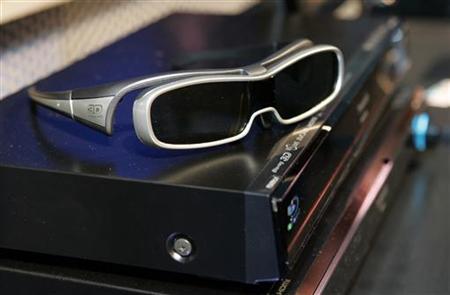 
A pair of Active Shutter 3D glasses sit on top of a Panasonic 3D Blu-ray player during a news conference at the 2010 International Consumer Electronics Show (CES) in Las Vegas, Nevada January 6, 2010. REUTERS/Steve Marcus

