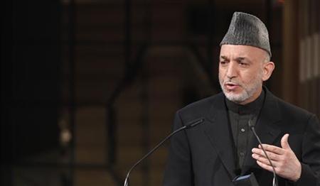 
Afghan President Hamid Karzai holds his speech during the third day of the 46th Conference on Security Policy in Munich February 7, 2010. REUTERS/Michaela Rehle
