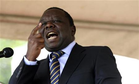 Zimbabwe's Prime Minister Morgan Tsvangirai addresses a gathering to commemorate the first anniversary of the death of his wife Susan at Glamis Arena in Harare March 6, 2010. REUTERS/Philimon Bulawayo
Zimbabwe's Prime Minister Morgan Tsvangirai addresses a gathering to commemorate the first anniversary of the death of his wife Susan at Glamis Arena in Harare March 6, 2010. REUTERS/Philimon Bulawayo