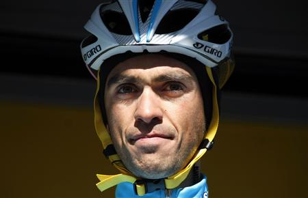 
Astana's team rider Alberto Contador of Spain is seen before the start of the first stage of Paris-Nice cycling race between Saint-Arnoult-en-Yvelines and Contres March 8, 2010. REUTERS/Eric Gaillard
